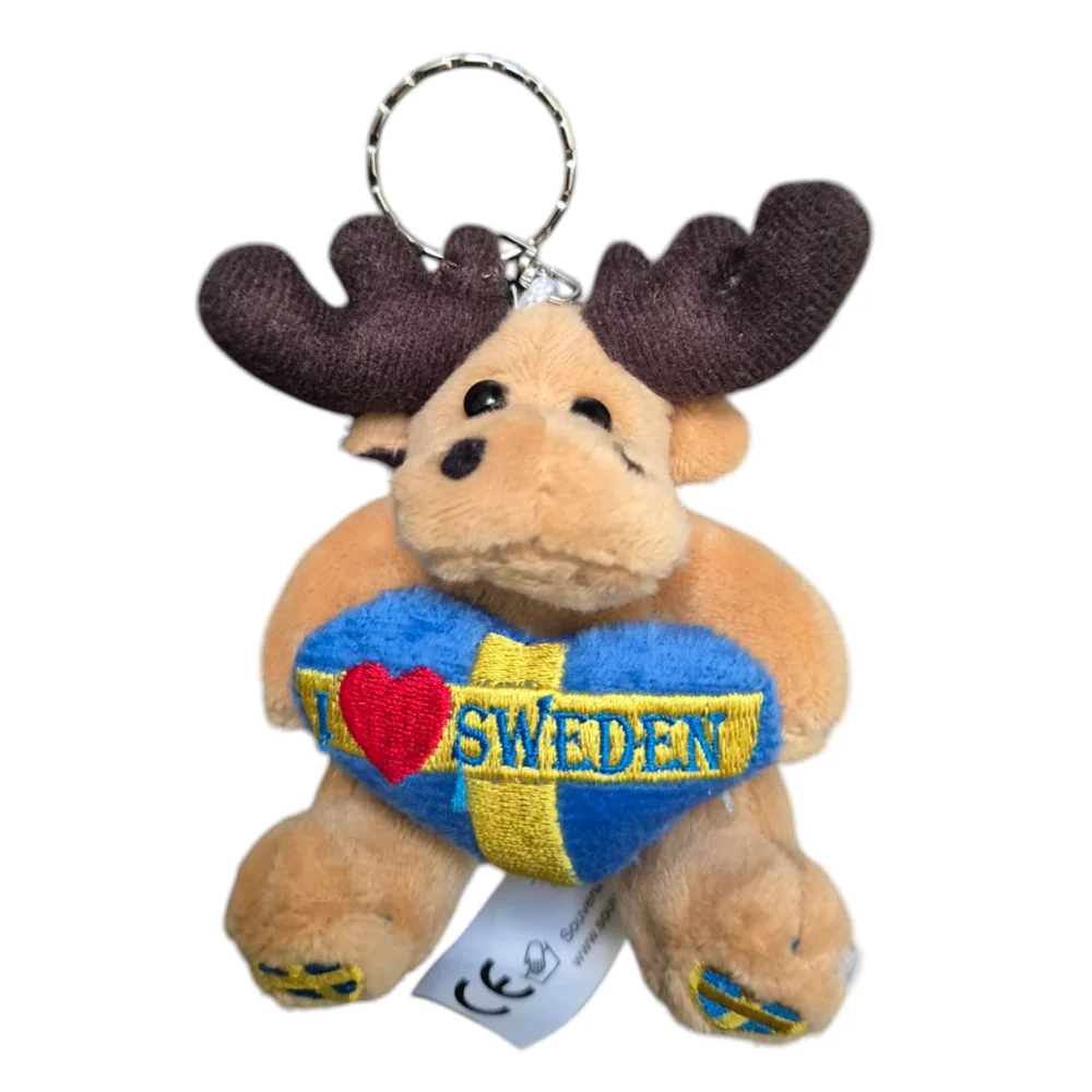 Moose keychain plush featuring a tan moose holding a blue heart that says I Love Sweden