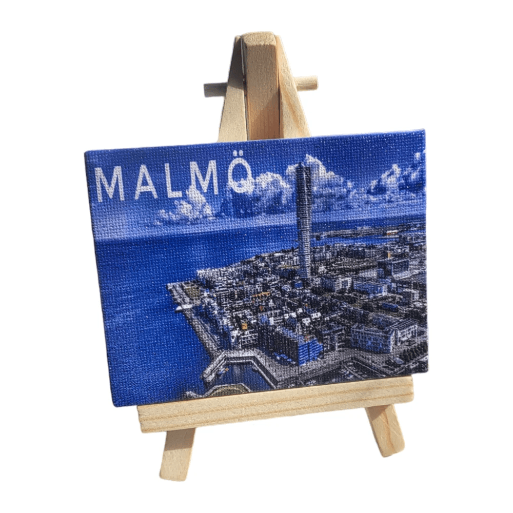Swedish souvenir canvas featuring a colorful illustration of traditional Swedish characters on a mini easel
