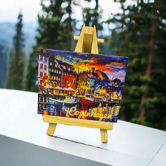 Vibrant Copenhagen canvas souvenir with colorful cityscape on a mini easel