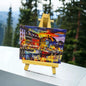 Vibrant Copenhagen canvas souvenir with colorful cityscape on a mini easel
