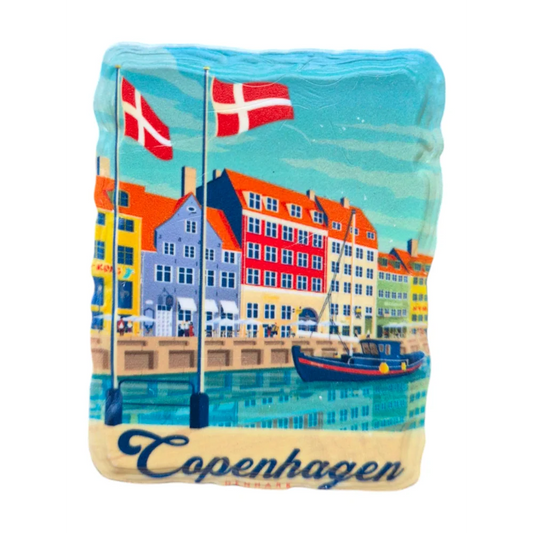 Copenhagen fridge magnet featuring colorful row houses and Danish flags by the waterfront
