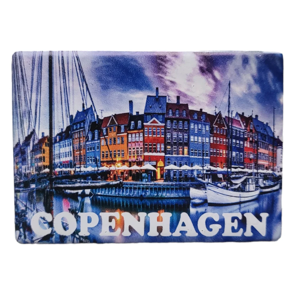 Copenhagen fridge magnet featuring colorful buildings and boats by the water in Copenhagen