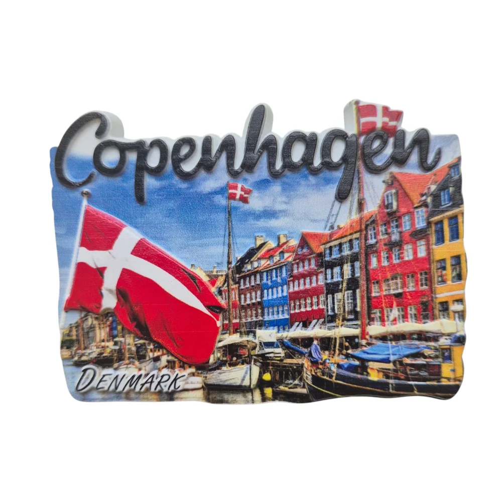Copenhagen fridge magnet souvenir featuring colorful buildings and Danish flag at Nyhavn waterfront