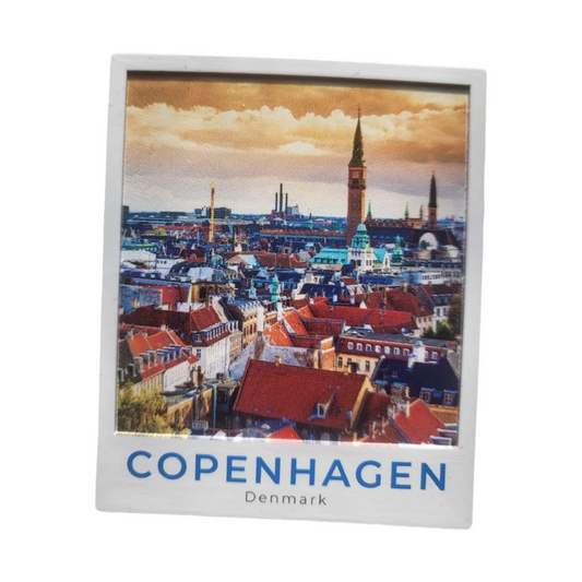Copenhagen polaroid fridge magnet showcasing a scenic view of Copenhagen rooftops and tower