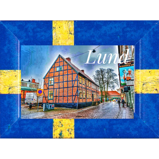 Lund fridge magnet featuring a historic brick building and a blue-yellow Swedish flag design