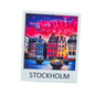 Colorful Stockholm Old Town souvenir fridge magnet featuring historic buildings and vibrant sky