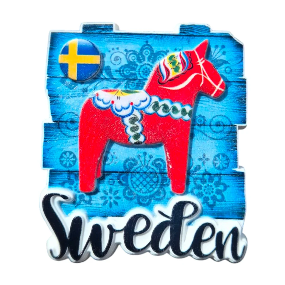 Dala horse magnet souvenir featuring a red horse on a blue background with Sweden flag