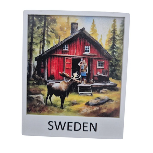 Viking house souvenir featuring a red cabin with a moose in front and the text Sweden